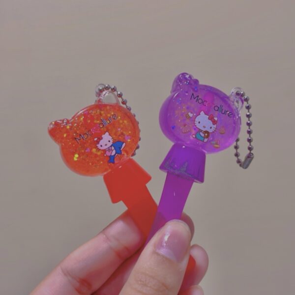 Gloss mágico hello kitty con llavero mocmallure